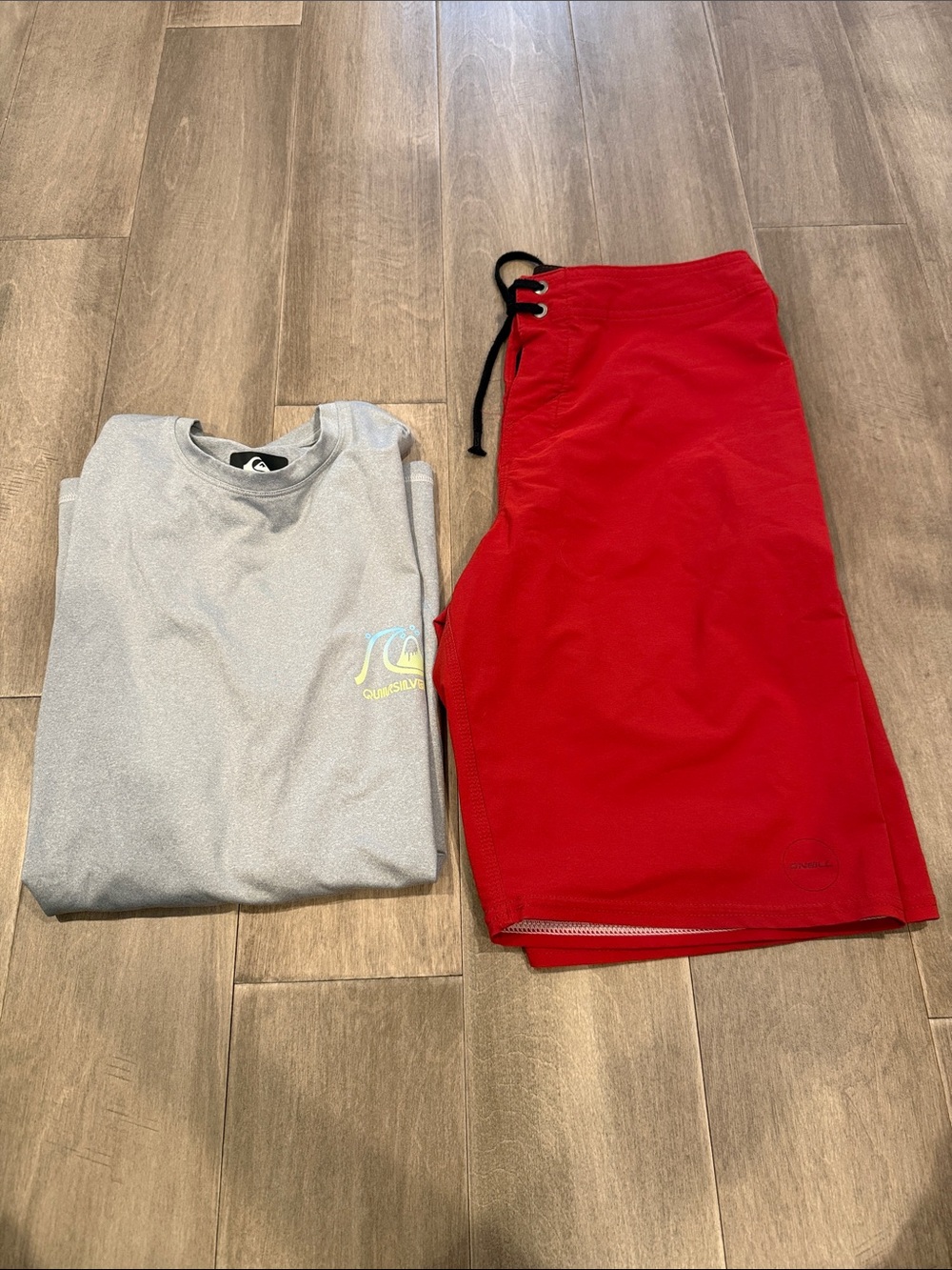 Quiksilver Gray Rash Guard with Red Boardshorts